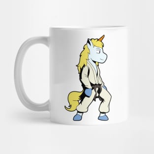 Cartoon unicorn doing judo Mug